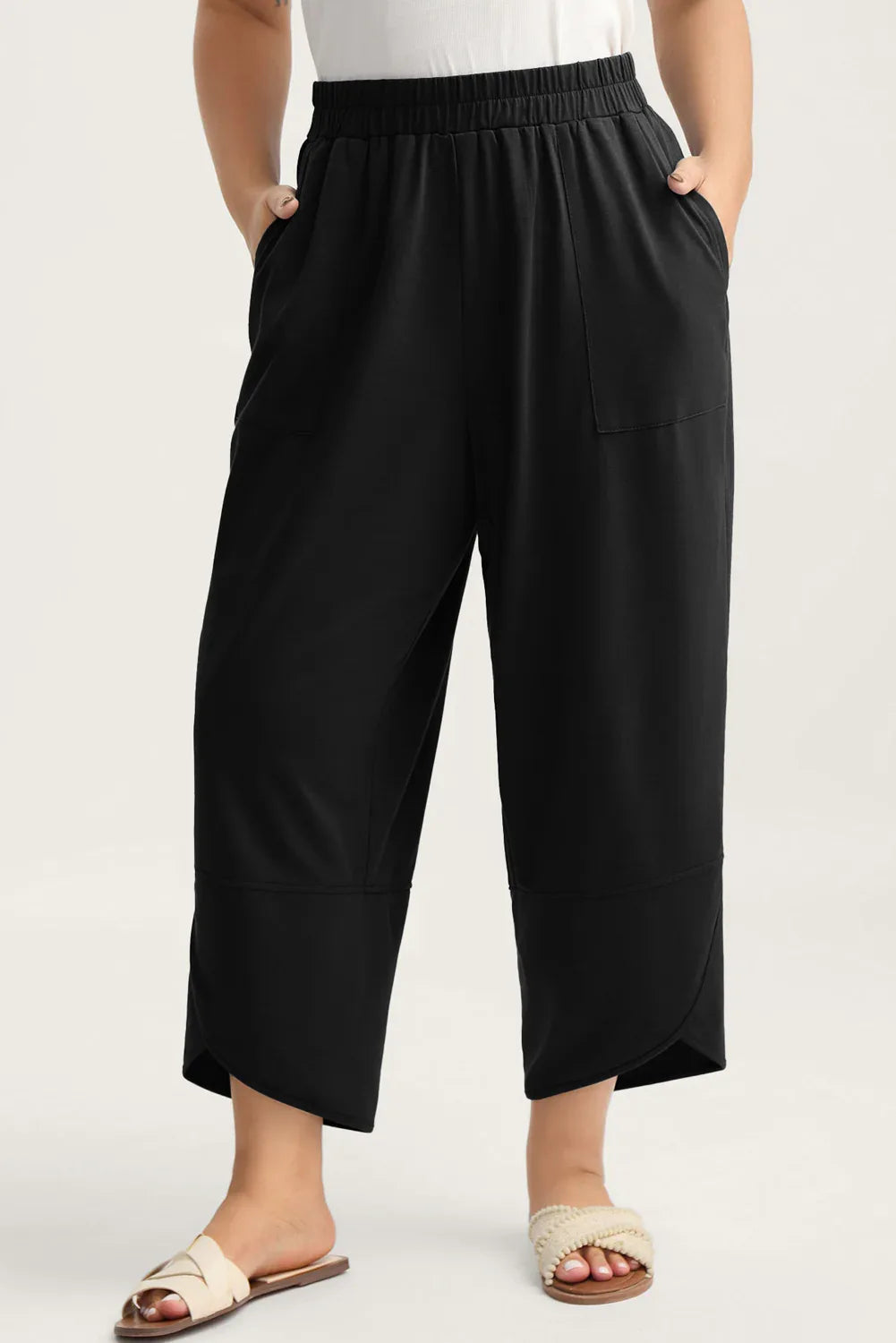 Black Plus Size Elastic Waist Asymmetrical Hem Loose Capris Pants - MarkoFit