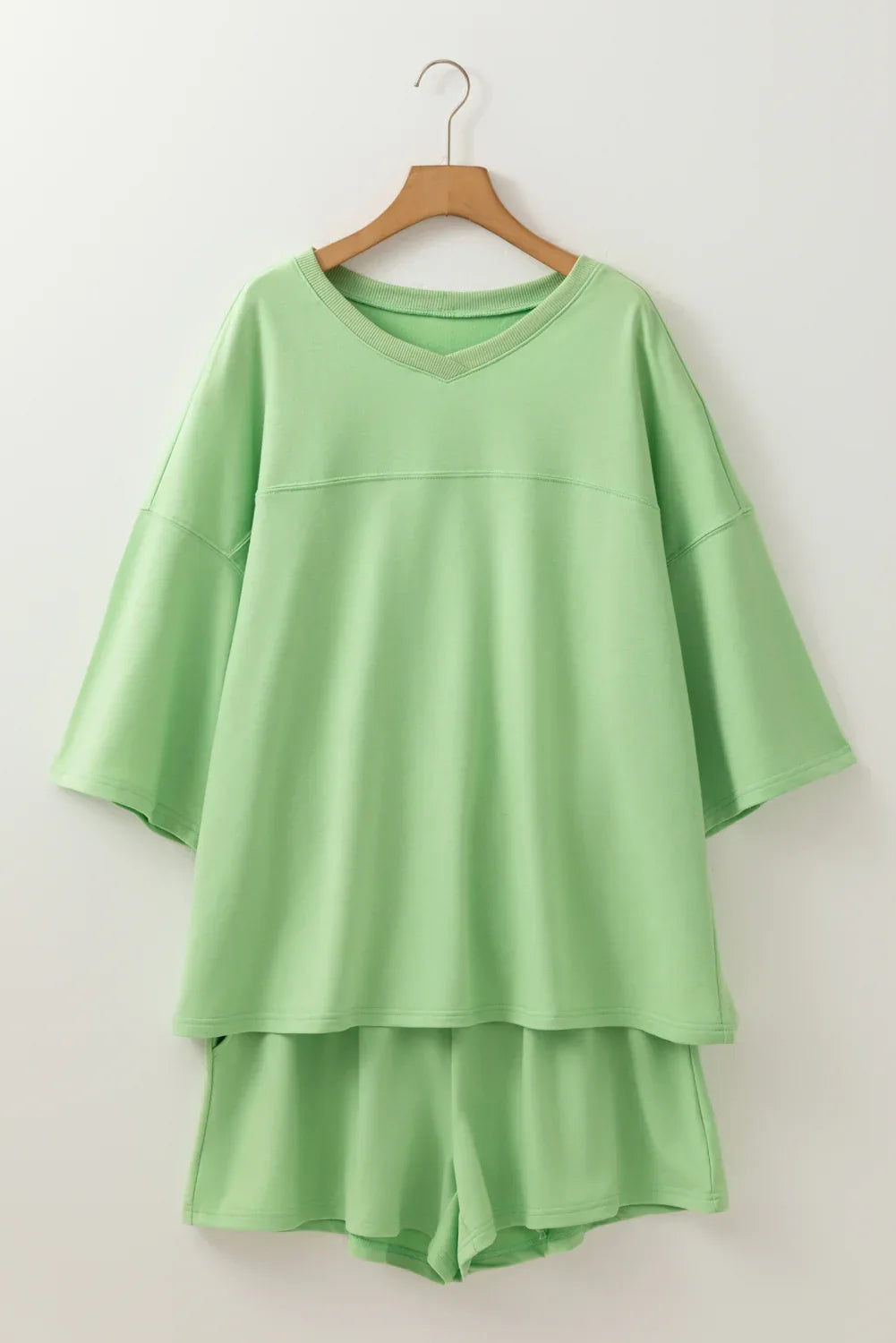 Meadow Mist Green Plus Size V Neck Drop Shoulder Tee Loose Shorts 2pcs Outfit - MarkoFit