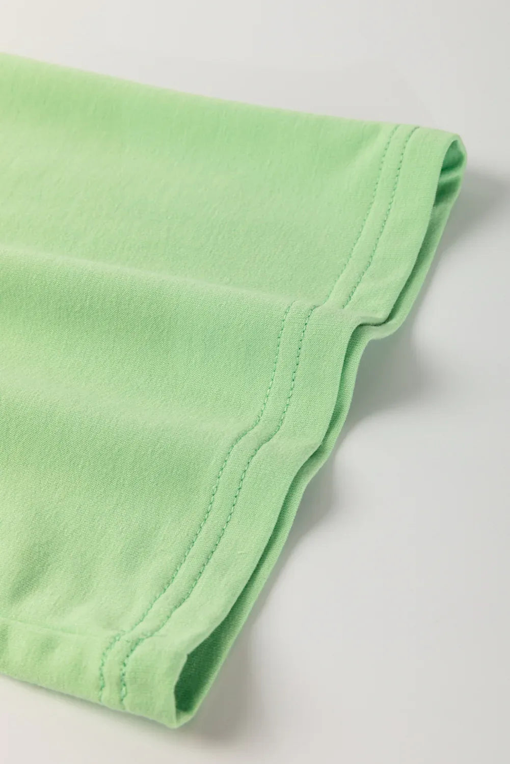 Meadow Mist Green Plus Size V Neck Drop Shoulder Tee Loose Shorts 2pcs Outfit - MarkoFit